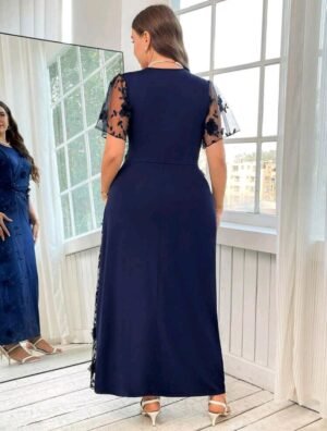 ABITO LUNGO IN TULLE CON RICAMI FLOREALI