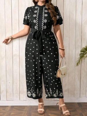 TUTA CON DETTAGLI GEOMETRICI E PUNTI BIANCHI