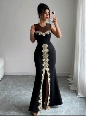 ABITO LUNGO ELEGANTE NERO CON RICAMI ORO E SPACCO