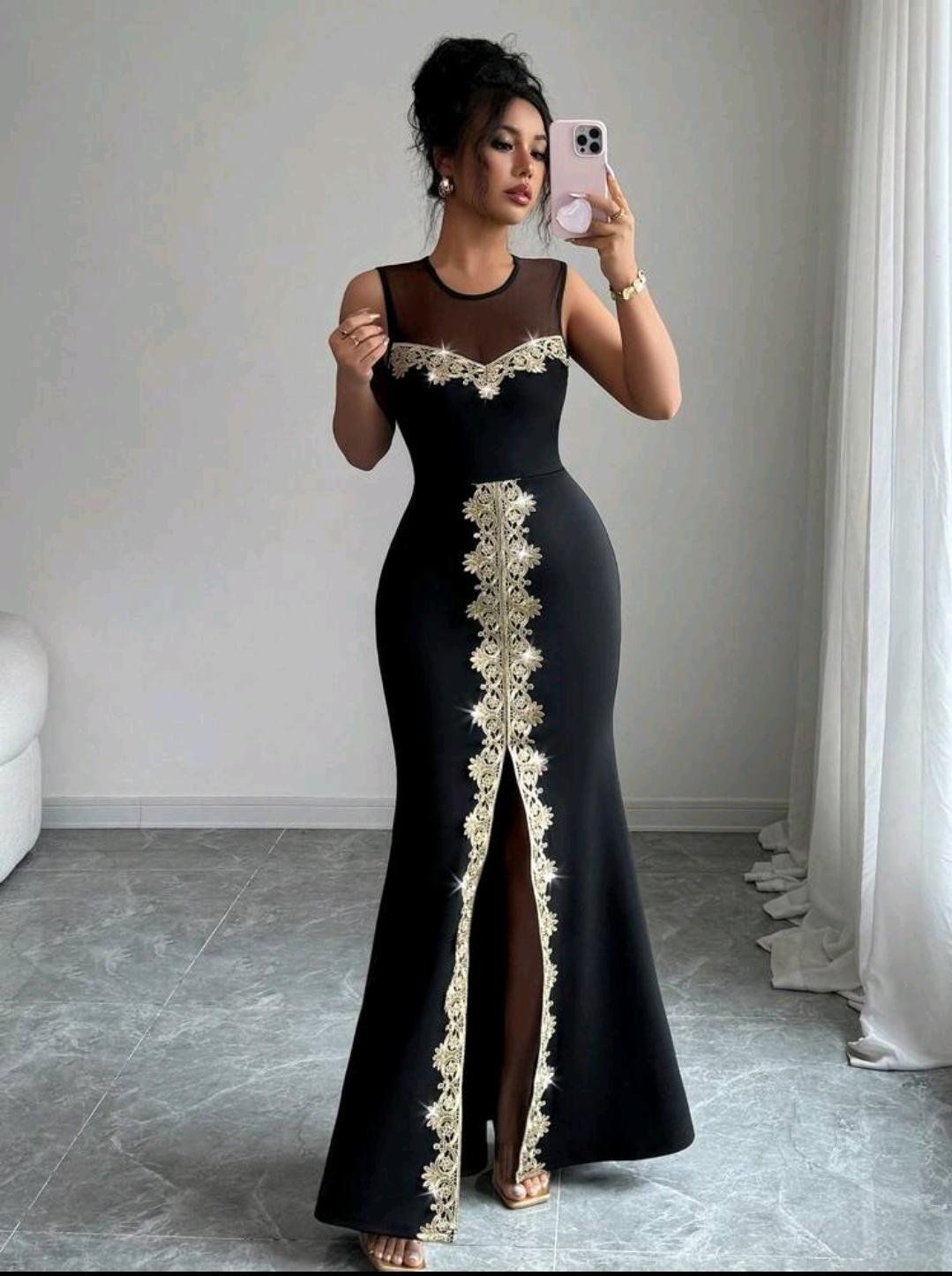 ABITO LUNGO ELEGANTE NERO CON RICAMI ORO E SPACCO